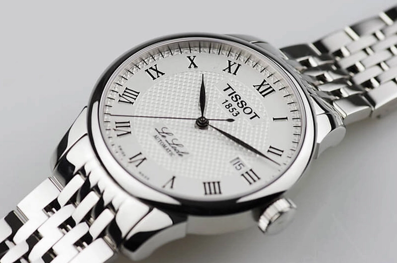 Đồng hồ Tissot của nước nào? Lịch sử và đánh giá chi tiết 2026 Logo Tissot 1853