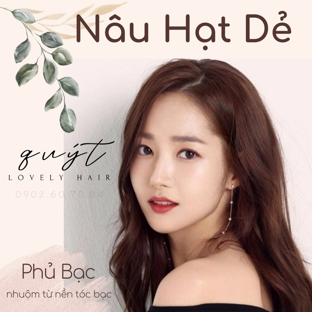 Nâu Hạt Dẻ Trầm: Xu Hướng Tóc Sang Trọng và Cuốn Hút 2026 Cô gái với mái tóc màu nâu hạt dẻ trầm bồng bềnh